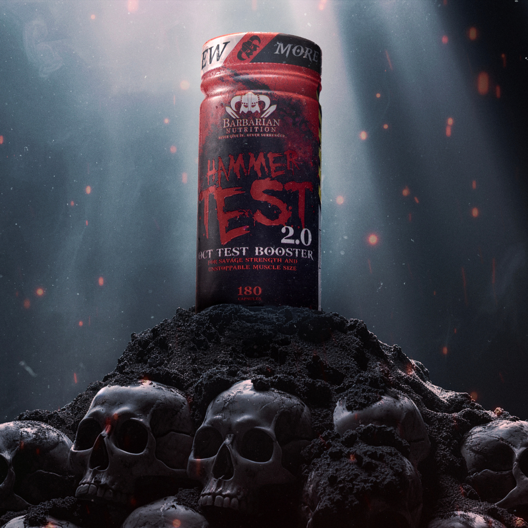 A container of Barbarian Hammer Test 2.0 supplement powder is displayed on a bed of skulls, with a dramatic dark and red color scheme, suggesting a supplement marketed towards bodybuilding or fitness.